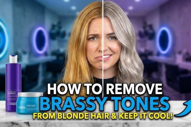A woman with bright, cool-toned blonde hair looking over her shoulder after washing with a neutralizing purple shampoo.