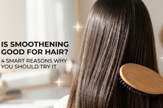 A woman with sleek, shiny, and perfectly smooth hair looking over her shoulder, demonstrating the results of a keratin treatment.
